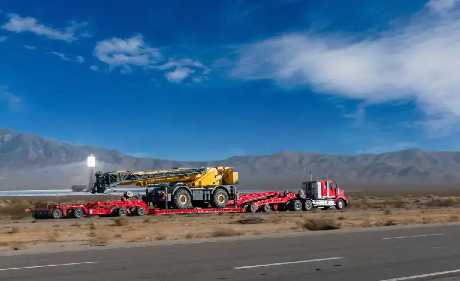 semi truck hauling heavy equipment