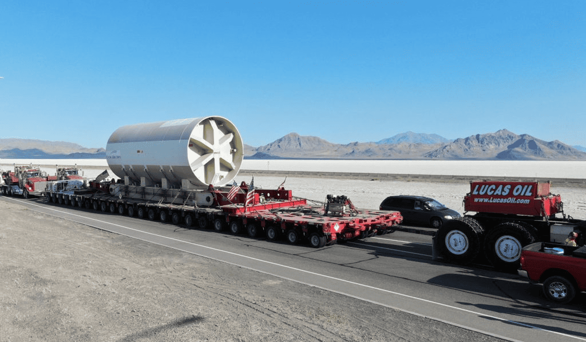 Oversized load on multi-axle trailer in desert